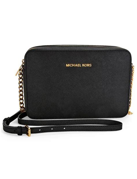 michael kors umhängetasche jet set travel schwarz gold|Jet Set Travel Extra.